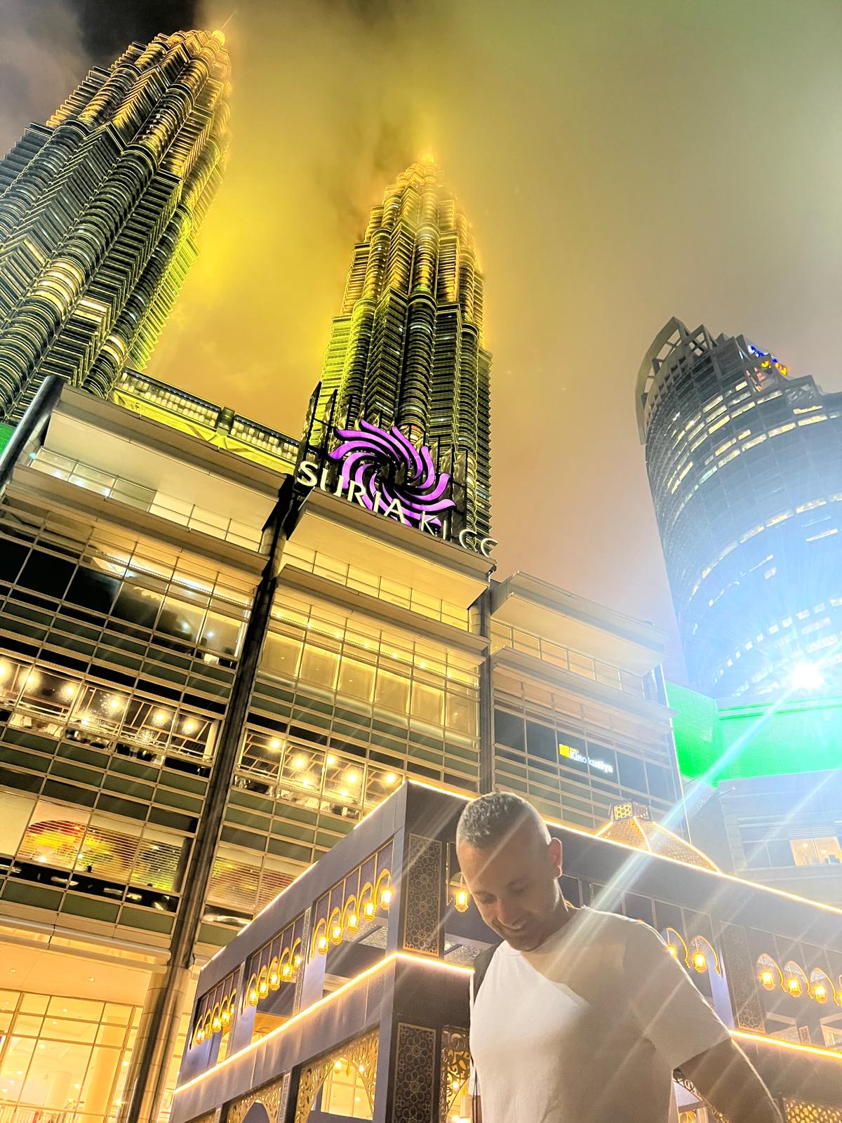 Eric in front of Petronas tower in KL